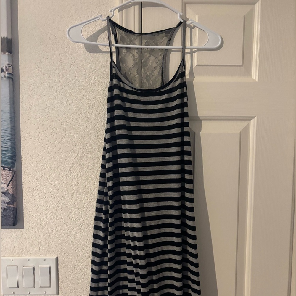 Slightly worn stripped floor length maxi dress